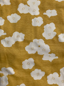 Yellow fabric with white flowers